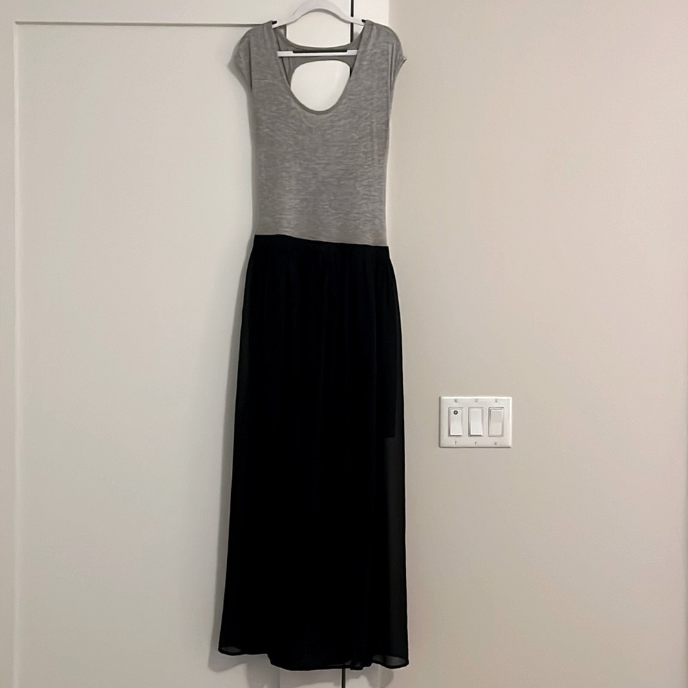 Jersey top dress with Sheer black maxi skirt with slit. Circle open back.